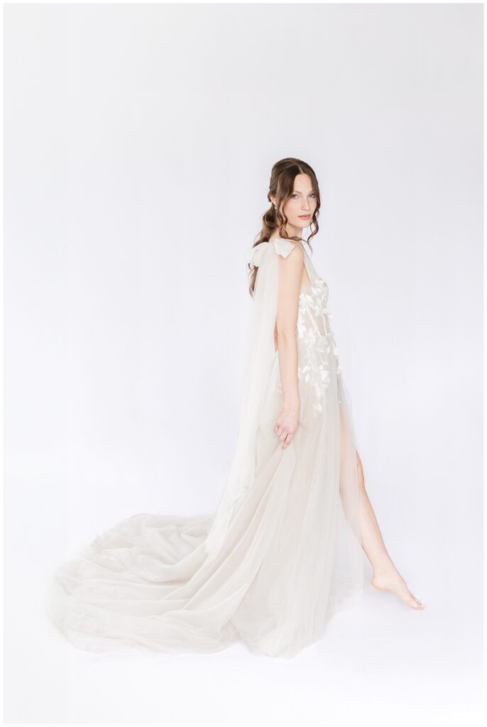 Ethereal bride in a soft romantic wedding dress from Bremelia Bridal