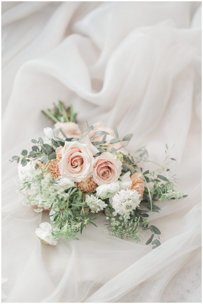 Bridal bouquet with soft pink roses, carnations, scabiosa, and Queen Anne's lace from Floral lab in Boston, MA.