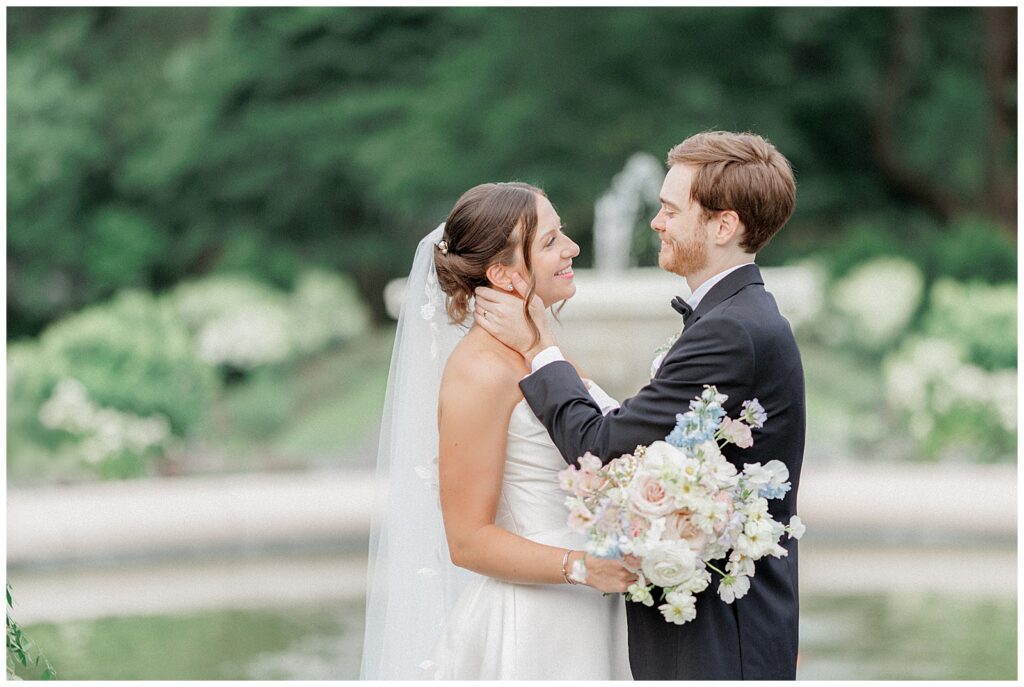 Bride and groom having a private moment at the Garden at Elm Bank.